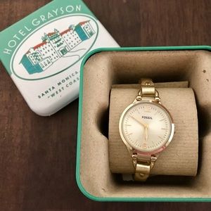 Women’s gold Fossil watch